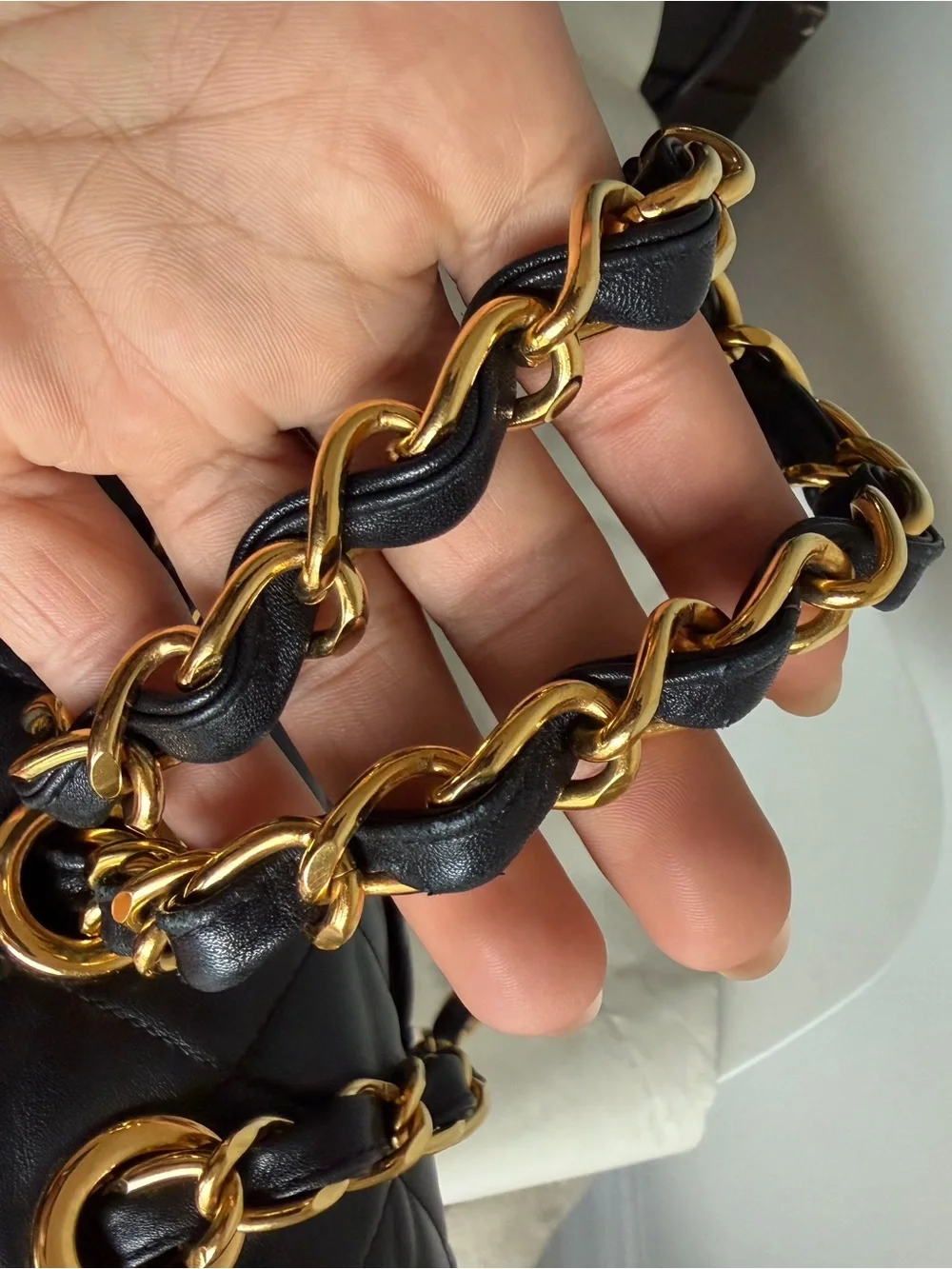 CHANEL Black Quilted Shoulder Bag with Gold Chain & CC Lock